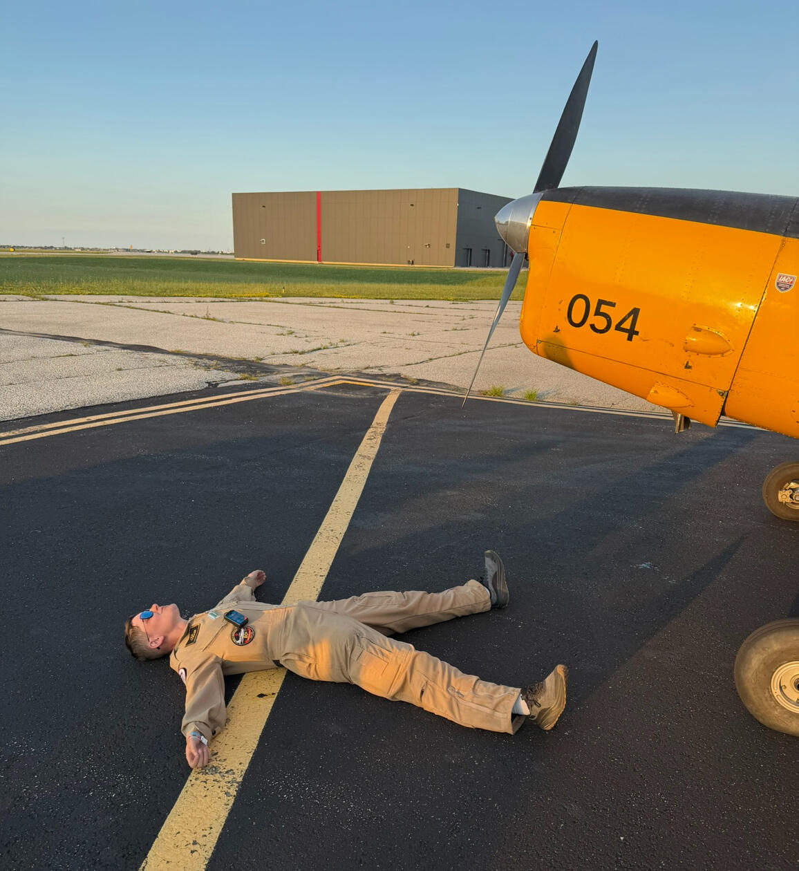 Lisa lying on her back on the apron.